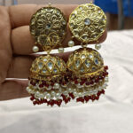 ALIRE JEWELS 24K Gold Plated Kundan Jhumka Earrings with pearls and red beads.