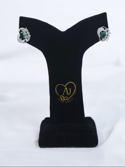 Emerald green zircon stud earrings Silver leaf motif emerald earrings Luxury green stone stud earrings for festive wear