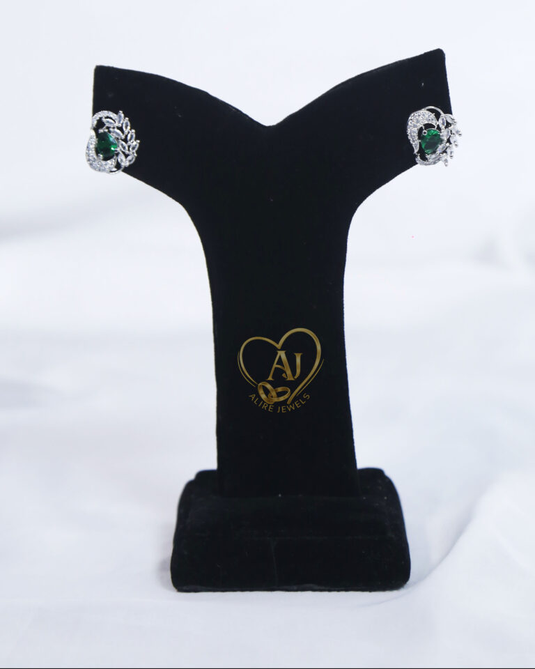 Emerald green zircon stud earrings Silver leaf motif emerald earrings Luxury green stone stud earrings for festive wear