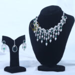 ALIRE JEWELS Emerald Green Stone Necklace Set with silver plated detailing and matching earrings