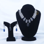 ALIRE JEWELS Bold Blue Tear Drop Stone Necklace Set with silver plated detailing and matching earrings