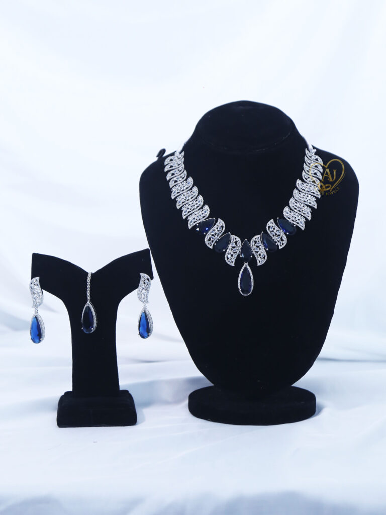 ALIRE JEWELS Bold Blue Tear Drop Stone Necklace Set with silver plated detailing and matching earrings