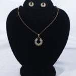 Eclipse Halo Zircon Pendant & Earrings Set – Bold Halo Jewelry Gold plated zircon halo necklace and earrings with statement centerpiece Luxury zircon jewelry set with anti-tarnish guarantee