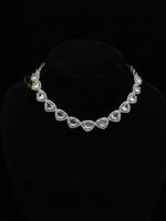 ALIRE JEWELS Heart Shaped White Crystal Necklace Set with silver plating, matching earrings and maang tikka