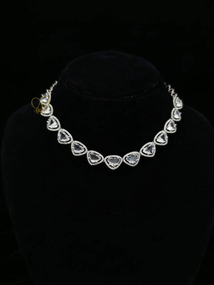 ALIRE JEWELS Heart Shaped White Crystal Necklace Set with silver plating, matching earrings and maang tikka