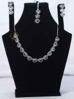 ALIRE JEWELS Heart Shaped White Crystal Necklace Set with silver plating, matching earrings and maang tikka