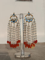 These Cascading Pearl Chain Kundan Earrings are designed to turn heads with their regal look. Backed by our 1-year anti-tarnish warranty 💎