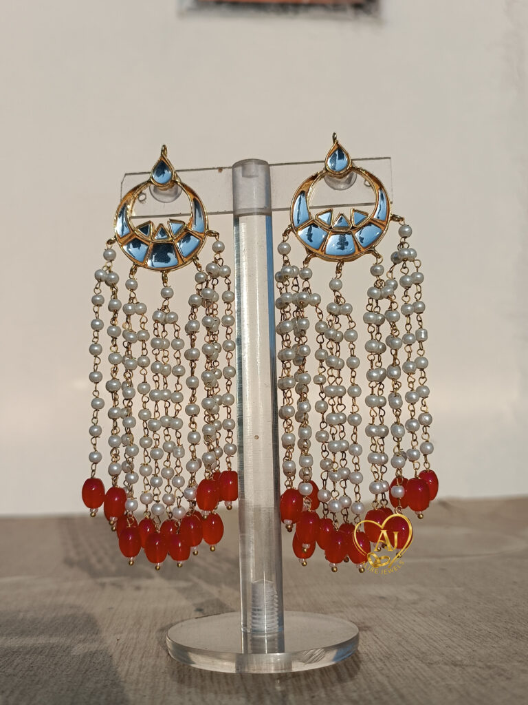 These Cascading Pearl Chain Kundan Earrings are designed to turn heads with their regal look. Backed by our 1-year anti-tarnish warranty 💎